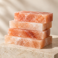 Original AI-generated mockup of a stack of pink salt bricks
